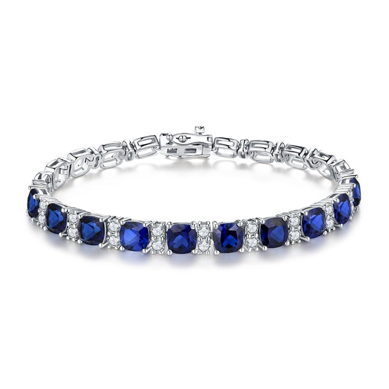 created blue sapphire and moissanite diamond tennis bracelet 6mm Holloway Jewellery
