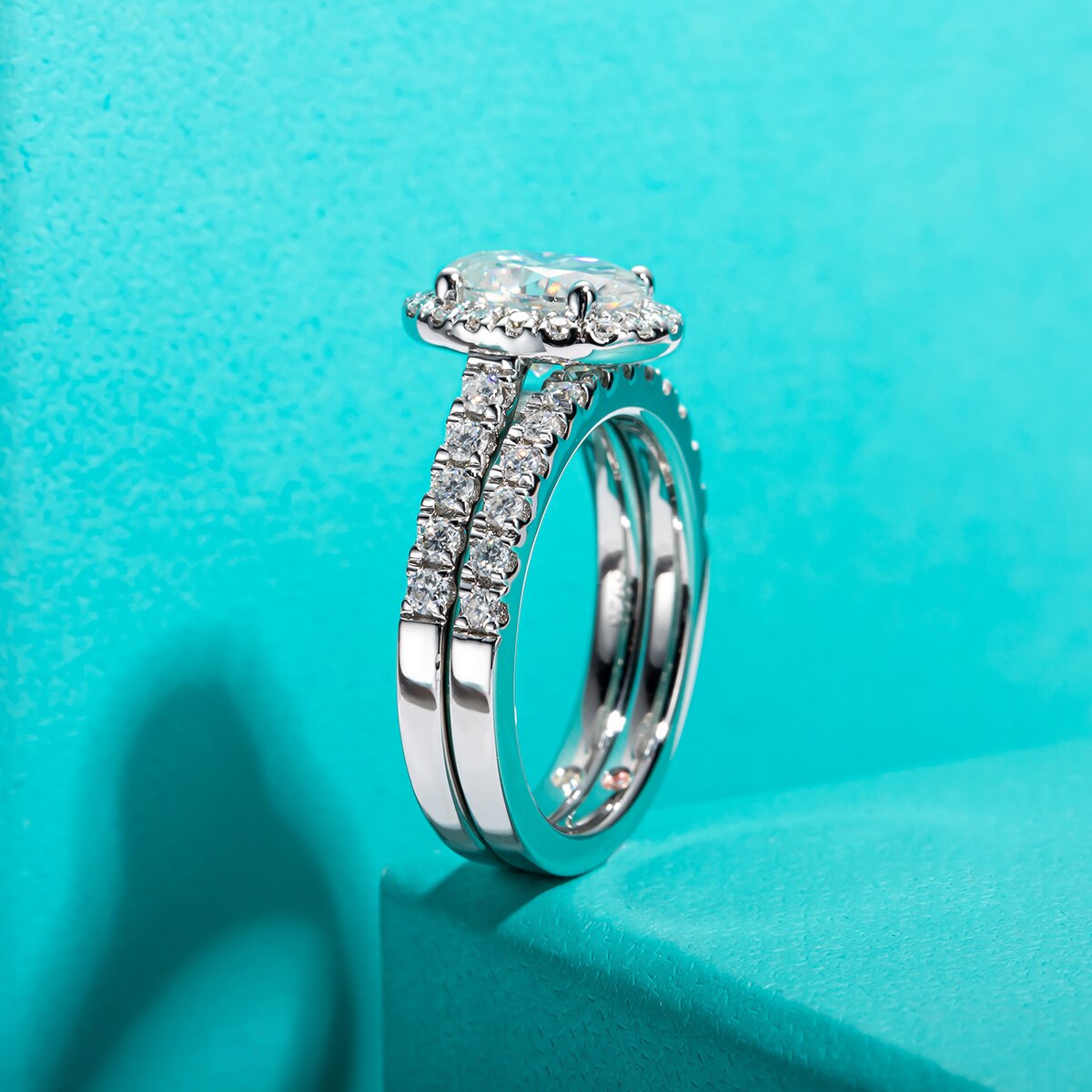 halo engagement ring with 2 carat oval moissanite diamond centerpiece