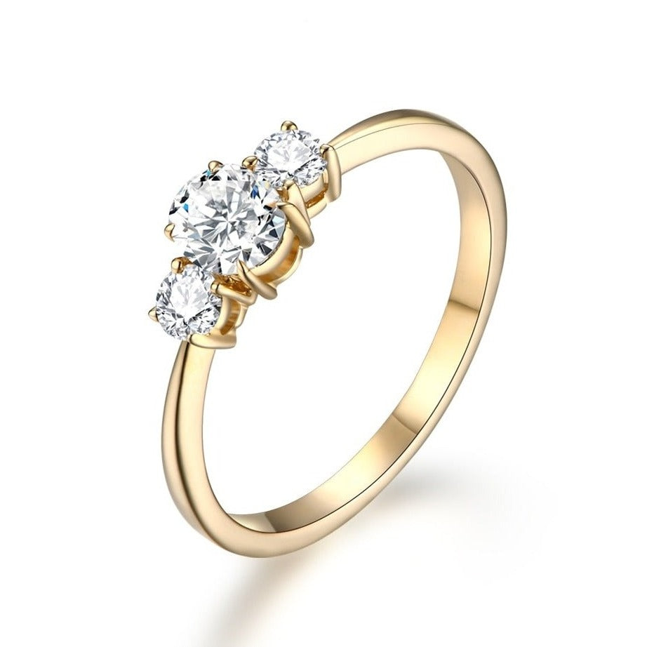 oval cut moissanite three stone ring Gold