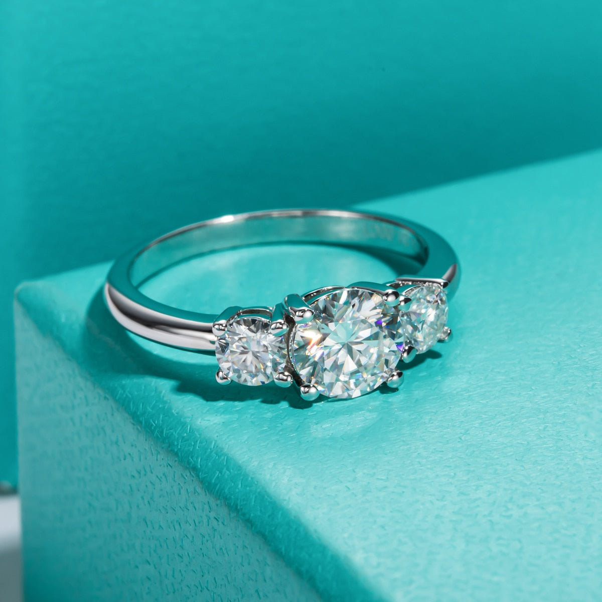 Tiffany and co hot sale 3 stone engagement ring