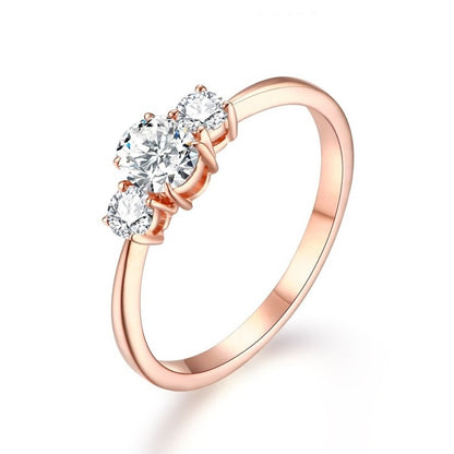rose gold three stone ring oval cut moissanite diamond Holloway Jewellery